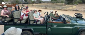 WOW travellers on an open safari vehicle in South Africa